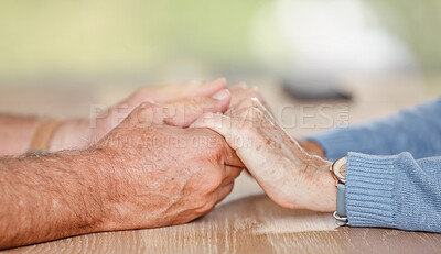 Buy stock photo Senior couple holding hands for love, support and trust in retirement, counseling and marriage. Closeup elderly old people, hand holding and hope, empathy or respect, kindness and gratitude with care
