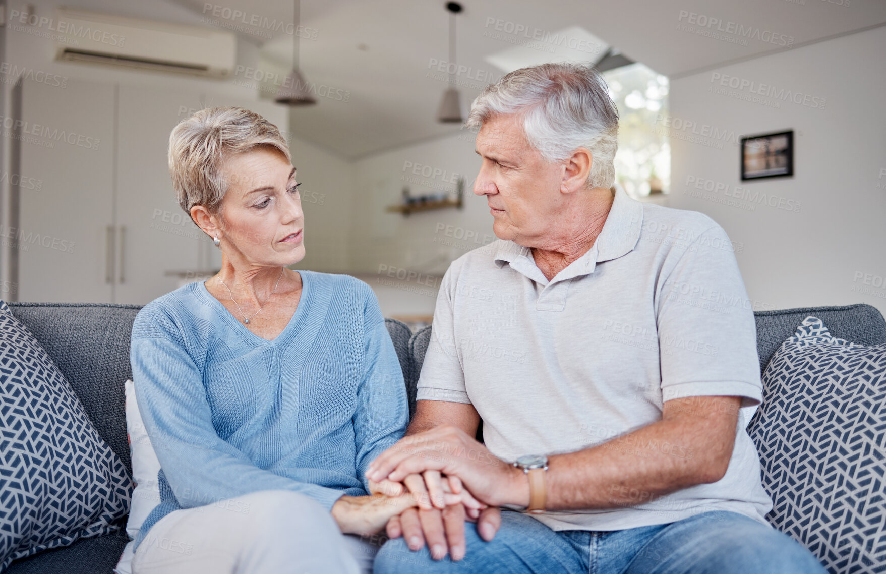 Buy stock photo Elderly couple, holding hands and living room of people with support from sad news at home. Senior, retirement and elderly care kindness showing trust, love and marriage care in a family house