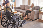 Soldier woman, wheelchair and therapist in talk, rehabilitation or support for war trauma. Psychologist, therapy or military officer for mental health, disability or communication for pain in Ukraine