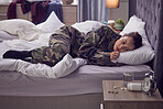 Army woman, pills or depression in bedroom of house, home or hotel and ptsd disorder, trauma or shell shock burnout. Military anxiety, mental health or stress and drugs overdose or treatment medicine