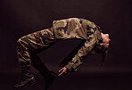 Military soldier, army woman and depression on a dark studio background for mental health, stress and anxiety problem for trauma. Female in camouflage clothes for art deco of PTSD and psychology