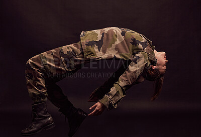 Buy stock photo Military soldier, army woman and depression on a dark studio background for mental health, stress and anxiety problem for trauma. Female in camouflage clothes for art deco of PTSD and psychology