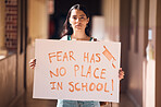 Woman, protest and poster for gun safety, stop fear in school and students freedom, government law and global justice. Portrait girl, sign and mass shooting problem, politics and support for change 