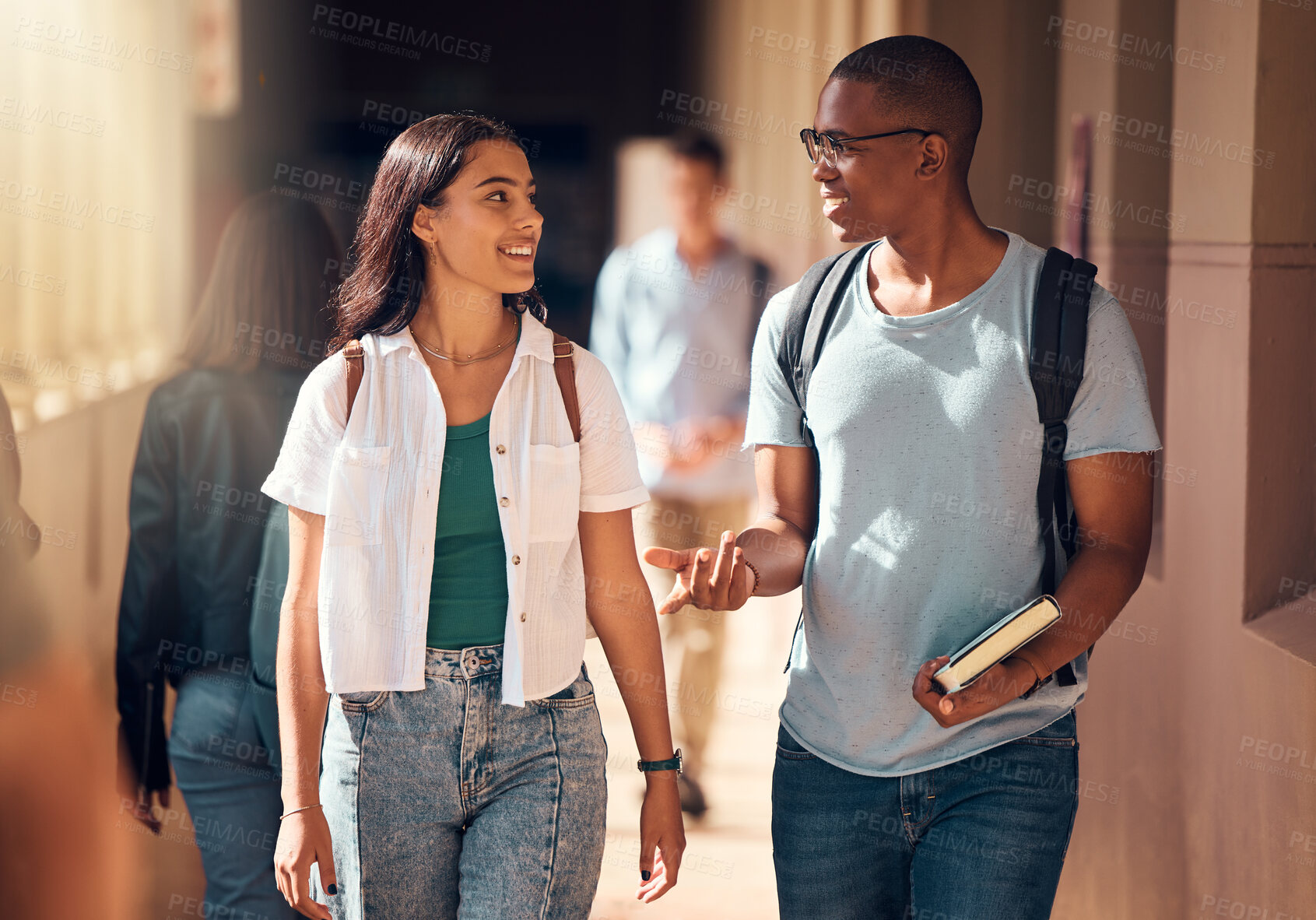 Buy stock photo Education, students and friends on campus for university, learning and conversation, walking to class and academic goals with book. Young, woman and man with college and study, learn with scholarship