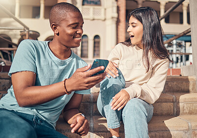 Buy stock photo Student, friends and phone in social media at campus for news, entertainment or connectivity in the outdoors. Man and woman students sharing conversation or discussion on smartphone at university