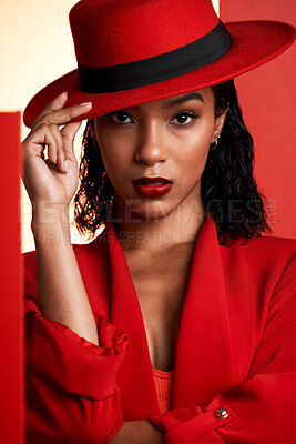 Buy stock photo Face, fashion and black woman in red hat, suit and stylish clothing. Portrait, beauty and aesthetic of female model from South Africa posing with makeup, cosmetics or edgy, classy and designer outfit