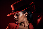 Fashion, makeup and black woman in studio with attitude, power suit and wellness on a black background. Fashionable, girl and model with vintage, smart and elegant clothing posing with sexy aesthetic