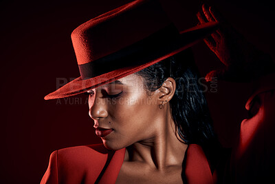 Buy stock photo Fashion, makeup and black woman in studio with attitude, power suit and wellness on a black background. Fashionable, girl and model with vintage, smart and elegant clothing posing with sexy aesthetic