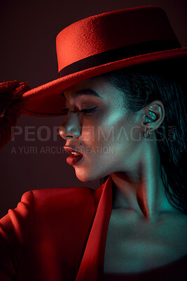 Buy stock photo Dark, sexy and black woman profile, fashion and red aesthetic, cool with edgy and retro style with studio background. Sensual, seductive and skin with beauty, vintage and designer hat with mystery.