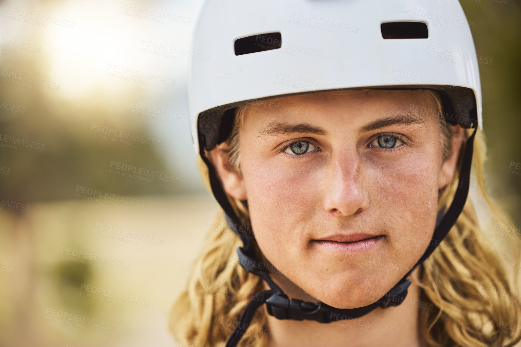 Buy stock photo Mountain biking, fitness and portrait of a man with a helmet in nature for safety, sports exercise and outdoor training for a race. Competition, motivation and face of a professional biker in a park