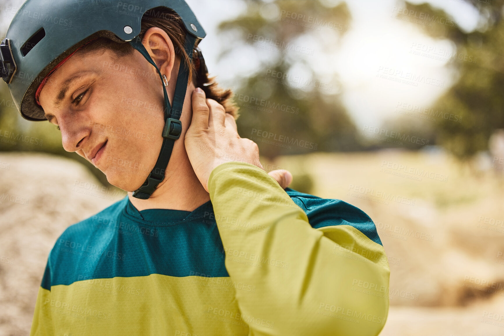 Buy stock photo Neck pain, injury and man cycling in nature, medical emergency and joint pain after an accident in Argentina. Fail, mountain bike mistake and person with pain in back muscle from fitness in a park