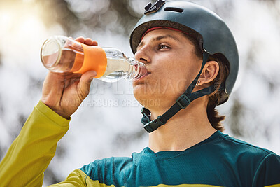 Buy stock photo Cycling, man and drinking water for exercise, bike training or workout recovery after mountain biking marathon in forest. Healthy athlete, hydrate and fitness for health and bicycle adventure outdoor