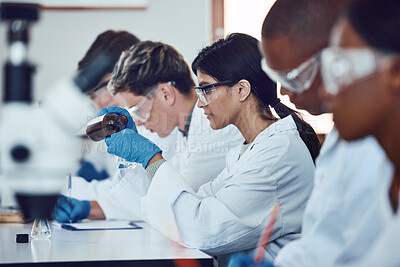 Buy stock photo Diversity, scientist and people in science exam, test or group project in experiment or assignment at laboratory. PHD students in scientific research, chemical or forensics with safety uniform in lab