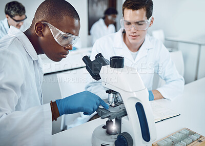 Buy stock photo Science, laboratory and team doing research with microscope for medical discovery, analytics and data. Healthcare, biotechnology and scientists collaboration for lab test, results and exam in clinic