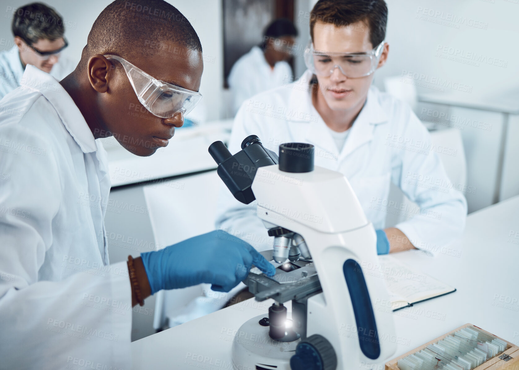 Buy stock photo Science, laboratory and team doing research with microscope for medical discovery, analytics and data. Healthcare, biotechnology and scientists collaboration for lab test, results and exam in clinic