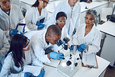 Buy stock photo Science, students and medical laboratory with microscope and mentor for pharmaceutical research, education and learning in class. Scientific and chemistry men and women group doing analysis of drug