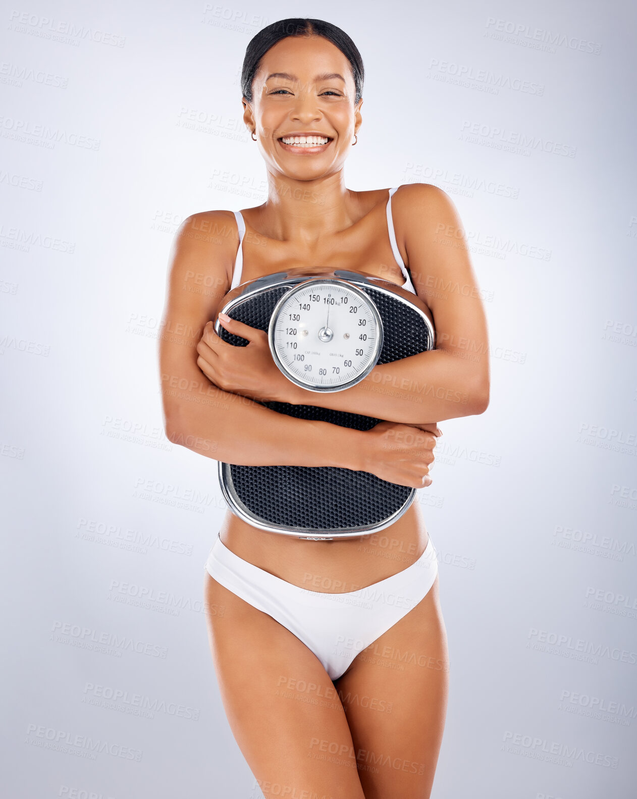 Buy stock photo Portrait, black woman and scale for diet, weight loss and smile for healthy lifestyle, wellness and relax on grey studio background. African American female, weigh and health for body care or balance