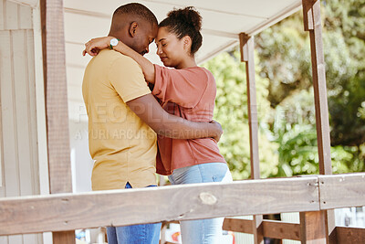 Buy stock photo Hug, love and black couple with care, peace and praying on the porch of their house together in New Zealand. Trust, relax and African man and woman with gratitude, affection and calm at their home