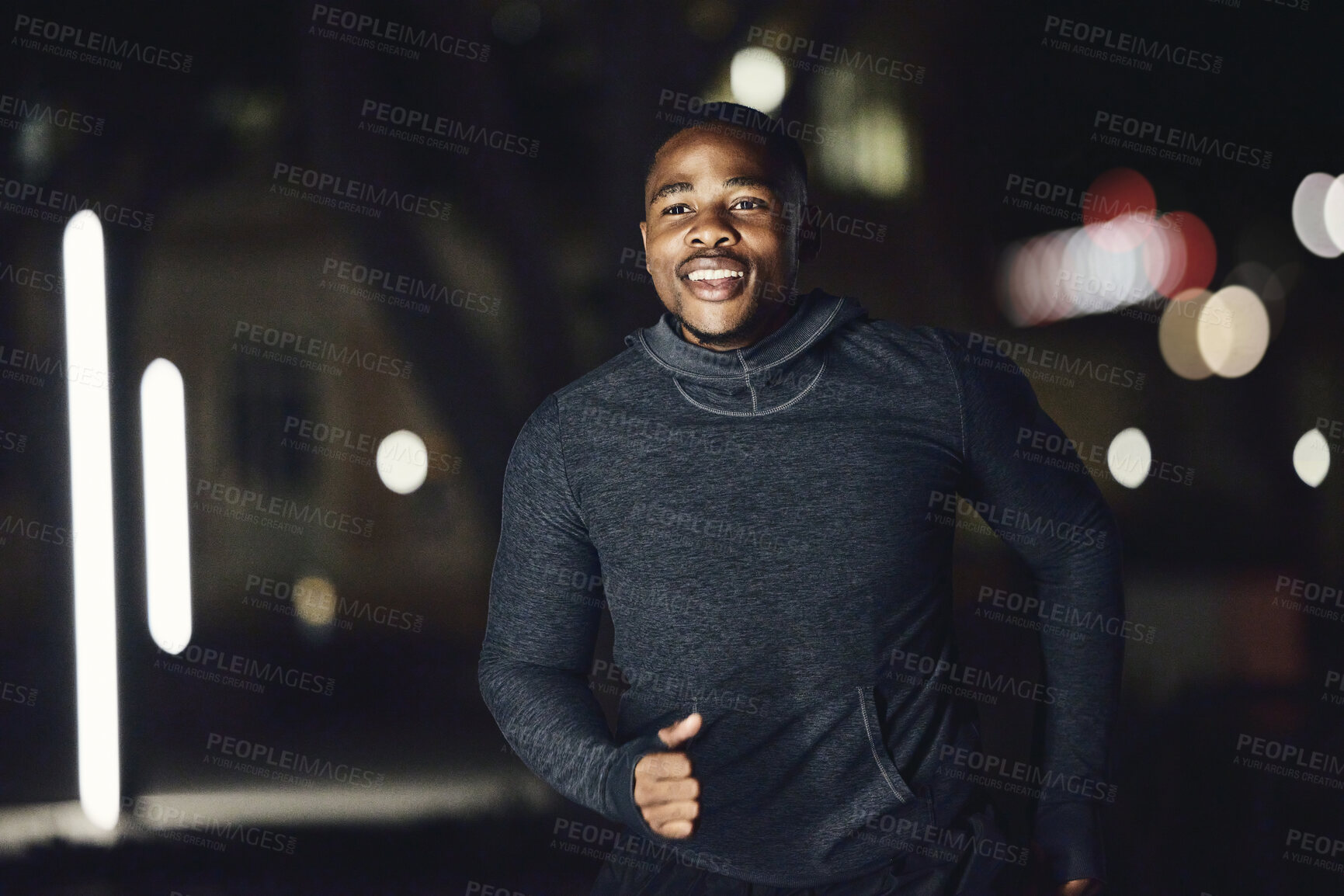 Buy stock photo Runner, health or fitness black man at night running in city, street or road for marathon training, race event or workout. Happy, smile or sports athlete for wellness exercise, goal target or success