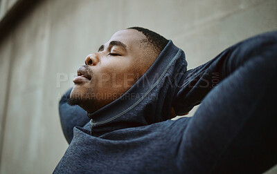 Buy stock photo Black man, relax and tired for training, workout and outdoor exercise, fitness and wellness. African American male, runner and athlete balance, closed eyes and peace after running, health and rest.