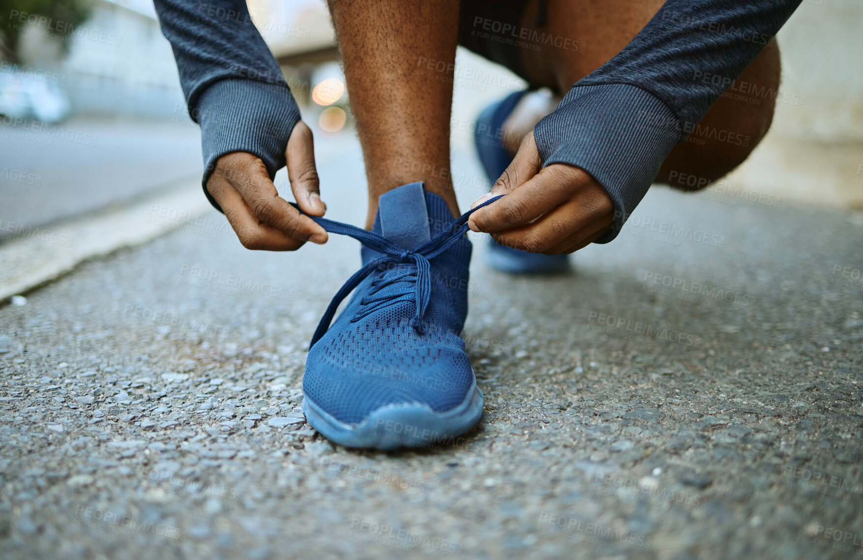 Buy stock photo Fitness, hands and shoes on man in a road for lace tie, exercise and running in a city, closeup and cardio. Hand, feet and runner, athletic and male in a street before sports, running and workout