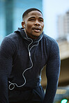 Breathe, black man and fitness break for city workout, wellness exercise and running outdoors. Runner, breathing and relax after cardio marathon with music earphones for motivation, mindset and goals
