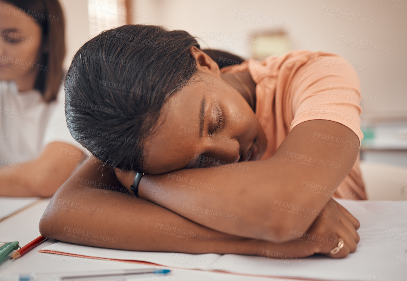 Buy stock photo Girl, teenager or classroom sleeping in stress, depression or mental health burnout in Indian education, learning or study school. Zoom, fatigue or tired student asleep on university college notebook