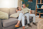 Senior couple, bonding or laughing on sofa, house or home living room in trust, love or Canada security. Smile, happy or comic retirement elderly, man or woman on relax furniture in funny comedy joke