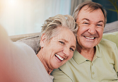 Buy stock photo Happy, love and selfie with old couple on sofa for relax, support or bonding with quality time. Retirement, marriage and smile with portrait of man and woman in living room at home for care affection