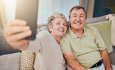 Buy stock photo Senior selfie, crazy and couple with a phone for communication, smile and relax on the sofa during retirement. Mobile photo, funny and elderly man and woman with technology for memory on the couch