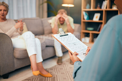 Buy stock photo Divorce, stress or old couple consulting a psychologist in counseling or therapy speaking of financial debt problems. Anxiety, writing or therapist listening to a senior woman and frustrated old man