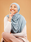 Muslim, fashion and woman in studio thinking of hijab beauty, makeup ideas and cosmetics with mockup and smile. Happy islamic model with designer fabric, silk and inspiration for Arab culture