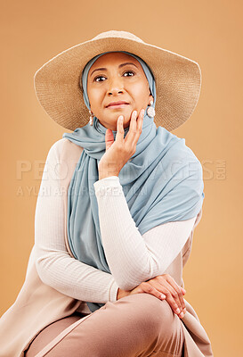 Buy stock photo Fashion, Muslim and senior woman with clothes for culture, stylish retirement and summer style against a brown studio background. Islam, happy and portrait of an elderly model with hijab clothing