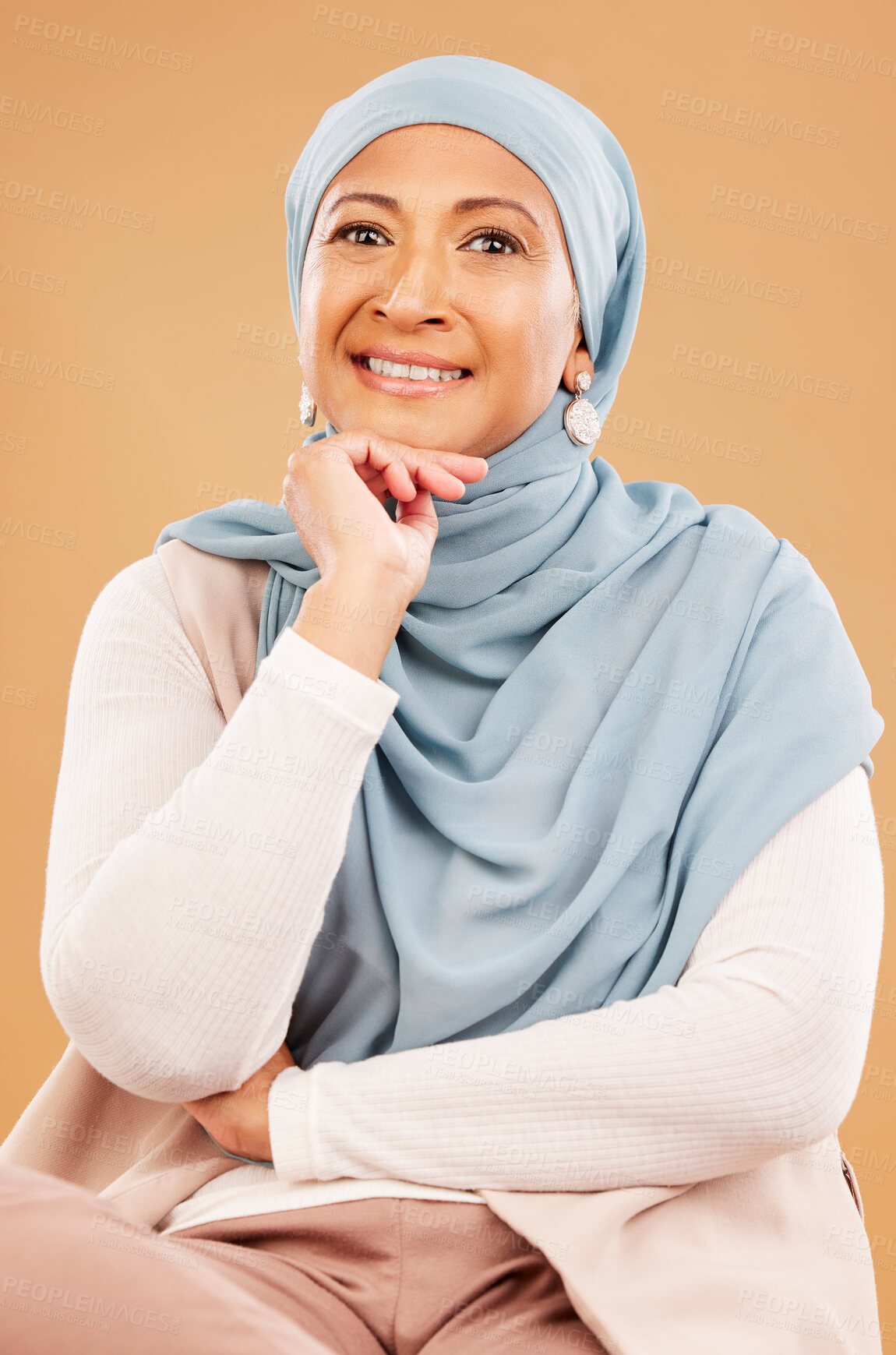 Buy stock photo Mature muslim woman, face and fashion hijab on studio background with religion empowerment, traditional ideas or human rights innovation. Happy portrait, middle aged islamic model with Iranian scarf