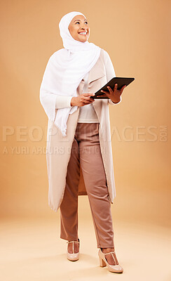 Buy stock photo Fashion, muslim and woman with tablet in studio isolated on a brown background mock up. Technology, touchscreen and mature Islamic female thinking of internet browsing, social media or web scrolling.