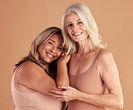 Senior woman, beauty and body positive underwear models for body care, equality empowerment or wellness inclusivity in brown studio. Plus size happiness, elderly people and health skincare motivation
