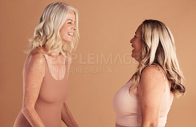 Buy stock photo Beauty, underwear and senior women friends in studio on brown background mockup. Skincare, cosmetics and elderly body positive females with healthy skin, laughing or smiling after antiaging treatment