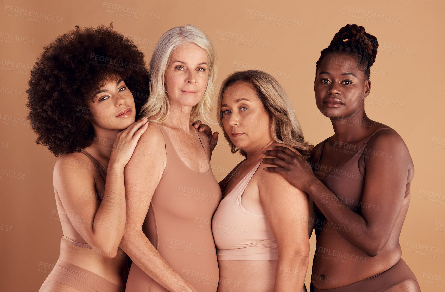 Buy stock photo Beauty, diversity and group of women in lingerie in studio on a brown background. Underwear, makeup or cosmetics of body positive friends or female models posing for feminine empowerment or self love