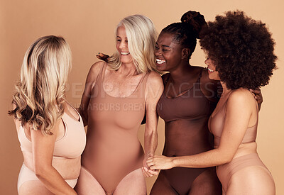 Buy stock photo Diversity, beauty and group of women in lingerie in studio isolated on a brown background. Underwear, self love and body positivity, empowerment and confident happy friends with different body types.