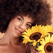 Skincare, natural and black woman portrait with sunflower bouquet for ...