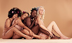 Diversity, women and hug of naked model group of friends feeling peace from eco friendly skincare. Nude, happy and relax woman feeling calm, happiness and beauty from skin glow and flower hair care
