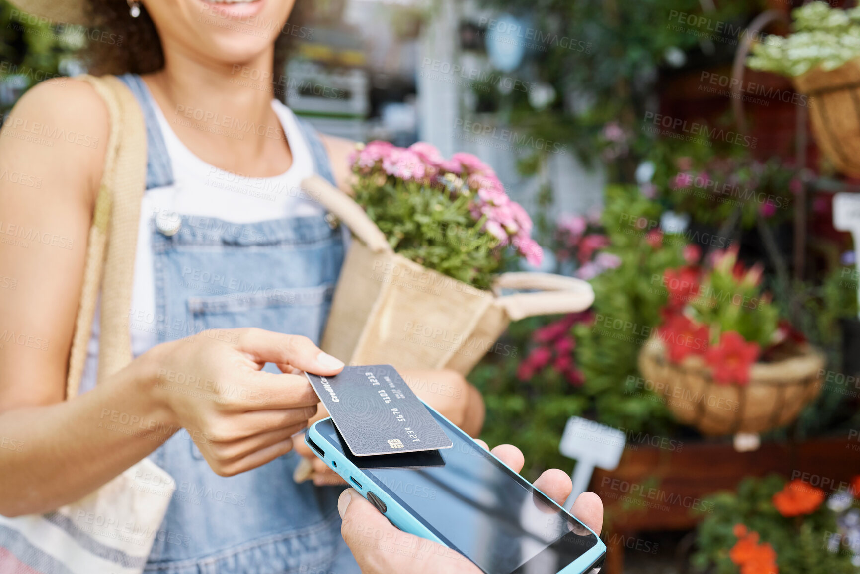 Buy stock photo Customer, shopping and credit card for florist shop payment with POS machine or phone for sale of flowers at small business. Hands of woman paying with rfid technology for service at retail store