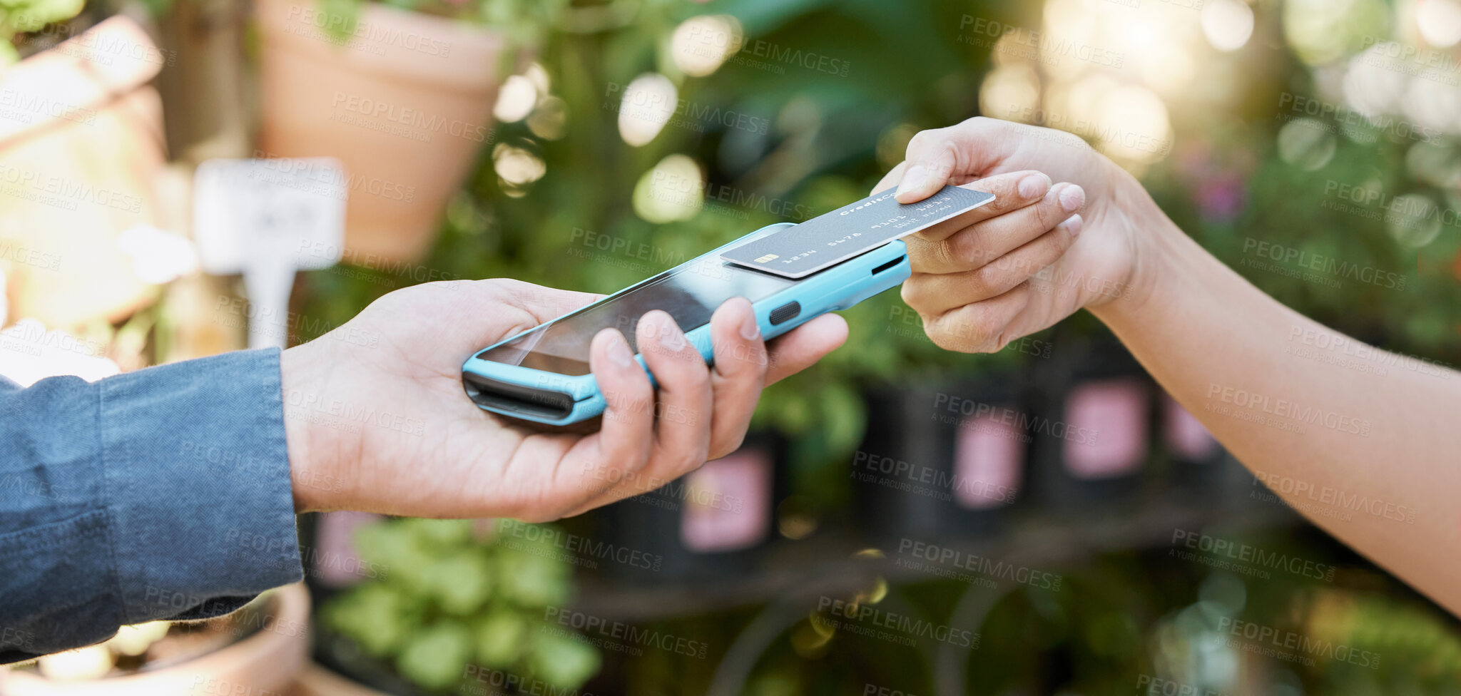 Buy stock photo Hands, payment and credit card with a customer using NFC technology to make a purchase at a florist. Money, finance and retail with a female consumer shopping for plants or flowers for gardening