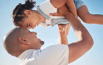 Buy stock photo Father with girl in air, support and happy for quality time, playful and bonding together outdoor. Man, daughter and holding to sky, love and happiness for break, lifting female child and family game