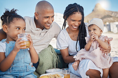 Buy stock photo Black family, beach picnic and love while on vacation eating food and having drinks while happy with mother, father and children. Baby with man, woman and sibling on summer holiday outdoor in nature