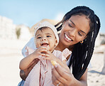 Food, mother and baby at a beach as a happy family on a fun picnic bonding, relaxing or eating on holiday in Brazil. Smile, mama and newborn child enjoys quality time at seashore on summer vacation