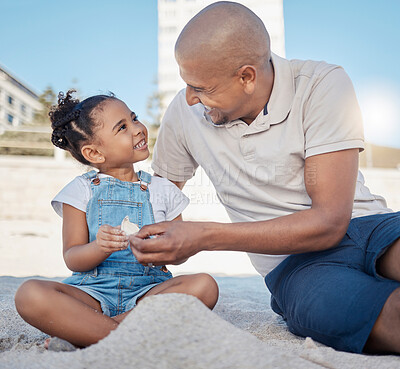 Buy stock photo Shell, happy and child with father at the beach for adventure, bonding and playing in the sand in Greece. Quality time, happy and girl with her dad at the ocean for family time, happiness and holiday