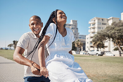 Buy stock photo Date, bike and summer with a black couple having fun together in a park by the promenade during vacation. Cycling, laughing and comic with a man and woman tourist enjoying travel on holiday