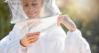 Buy stock photo Bee farming, woman and beekeeper with suit for safety, ready to work with honey, production and ppe for protection. Natural product, agriculture and bees with happy farmer and beekeeping outdoor.