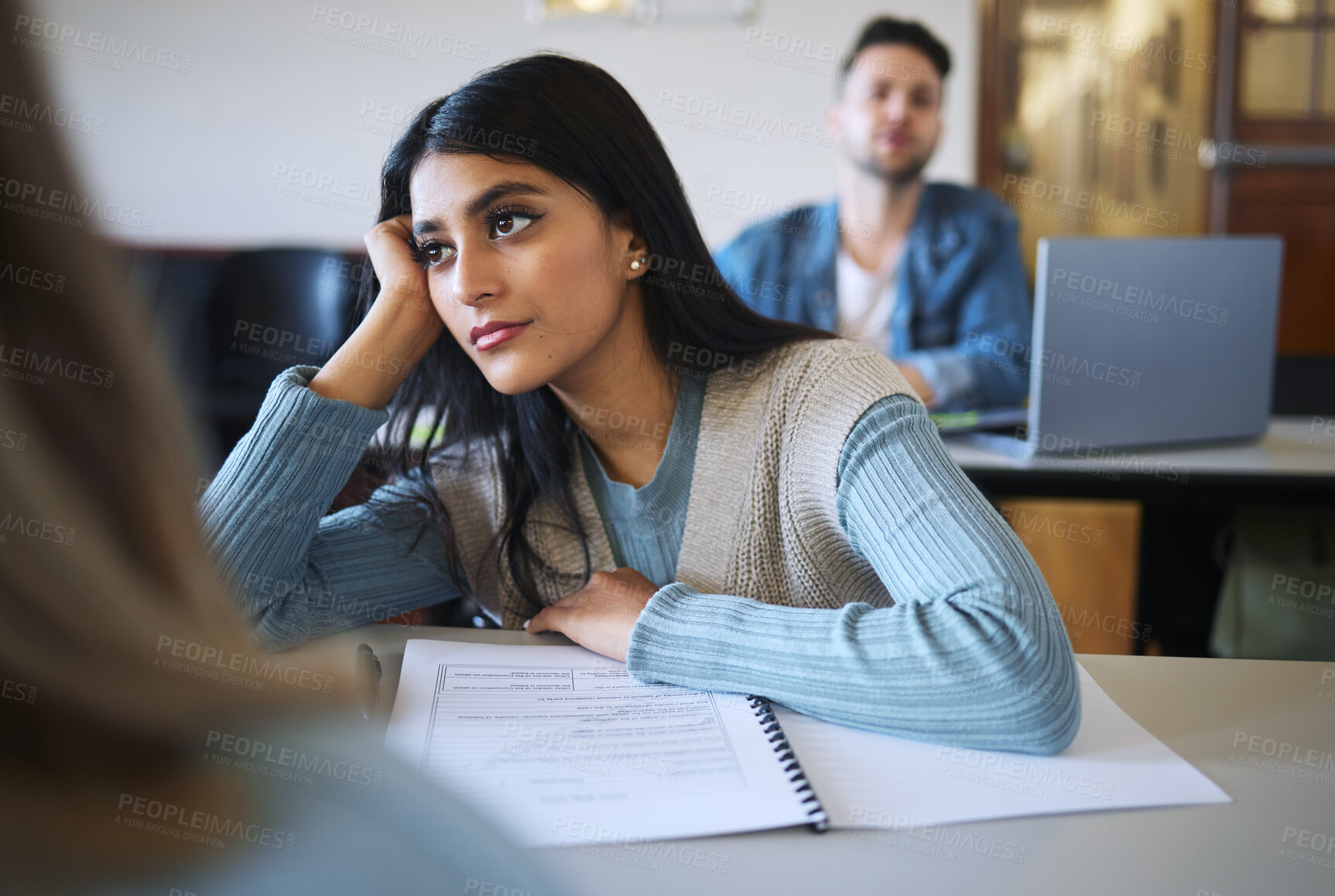 Buy stock photo Student woman, classroom and thinking for education, college or learning for idea development. University, class lecture or female college student with daydream, bored and attention at desk in London